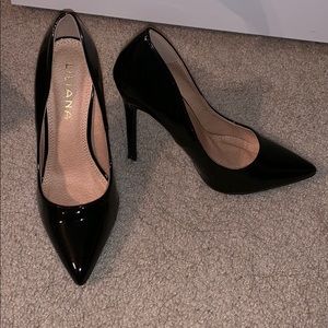 black leather pumps